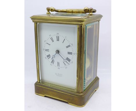 A John Simmons of Cheltenham brass and four glass sided carriage clock, 14.5cm