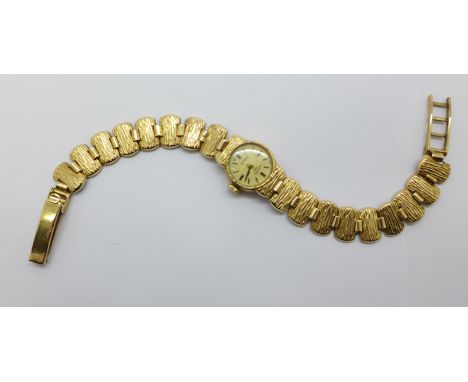 A lady's Rotary 9ct gold cased wristwatch with a 9ct gold bracelet, total weight 14.8g
