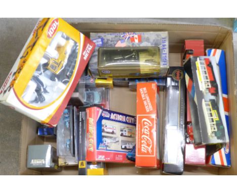 A Joal die-cast digger, JCB tractor and trailer and other die-cast model vehicles, boxed