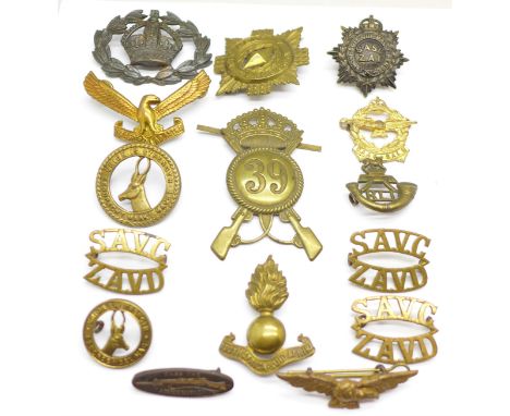 Assorted badges including Dorsetshire 39 Regiment, Kimberley Regiment and a badge with rifle marked Pass The Ammunition