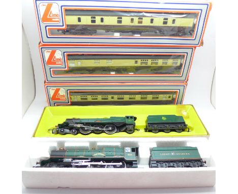 Two Hornby locomotives, Princess Victoria and King Edward I, boxed and three Lima carriages, boxed