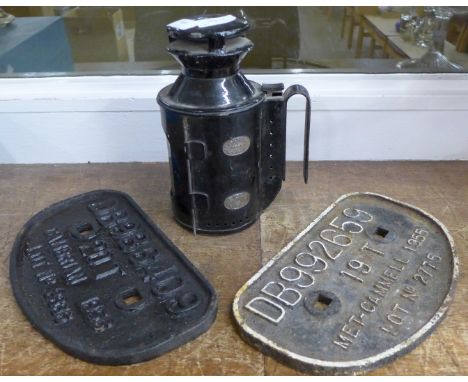 Two cast iron rail plaques and a B.R. lamp