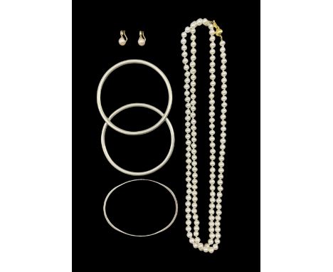Single strand pearl necklace, with 9ct gold clasp stamped 375, pair of 9ct gold pearl clip on earrings hallmarked and three s