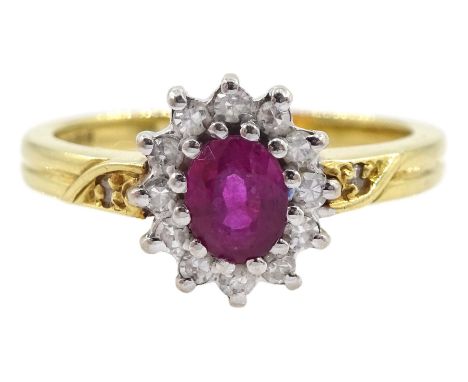 18ct gold oval ruby and diamond ring, hallmarked