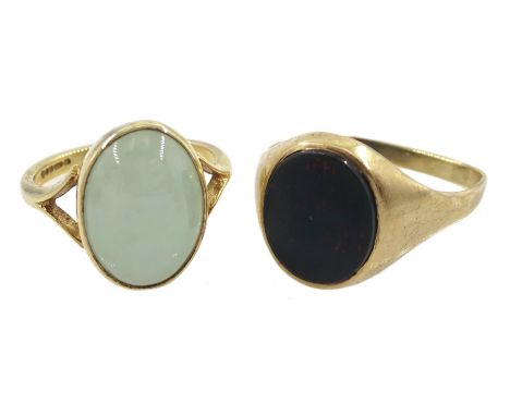 Gold bloodstone signet ring and a gold oval cabochon jade ring, both hallmarked 9ct