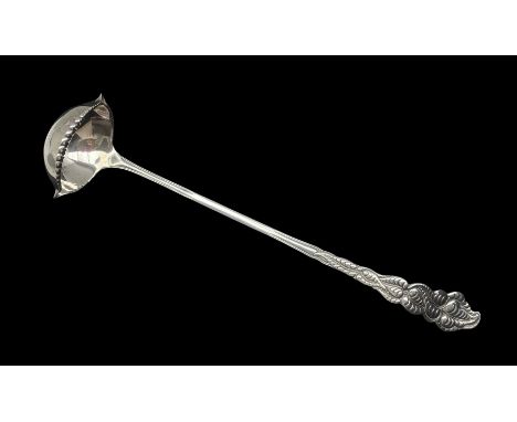Tiffany Sterling Silver punch ladle cast with stylised leaves and with double lipped bowl marked 'Tiffany &amp; Co, Sterling 