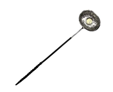 George III silver punch ladle with later embossed oval bowl inset with a silver shilling and with twisted whale bone handle L
