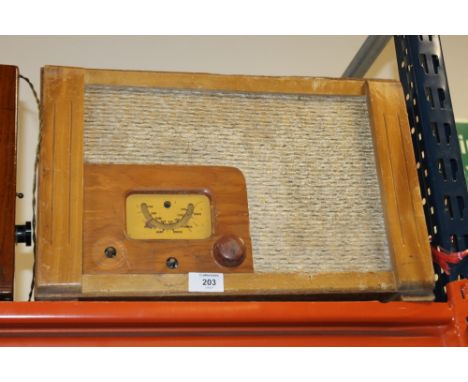 A RARE WW2 ERA ECONOMY RADIO LABELLED AS A WARTIME CIVILIAN RECEIVER PRODUCED BY THE RADIO INDUSTRY UNDER GOVERNMENT DIRECTIO