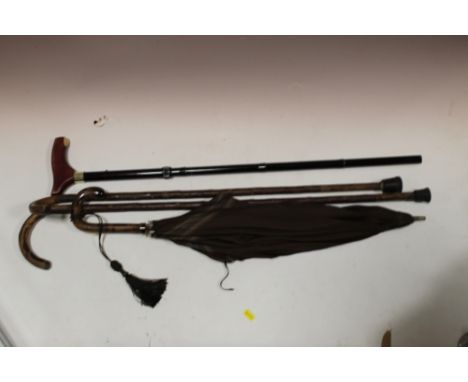 A VINTAGE PARASOL + A SELECTION OF WALKING STICKS