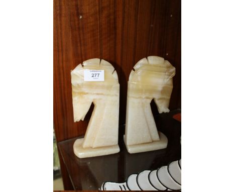 A PAIR OF VINTAGE 'ONYX' HORSE HEAD BOOK ENDS
