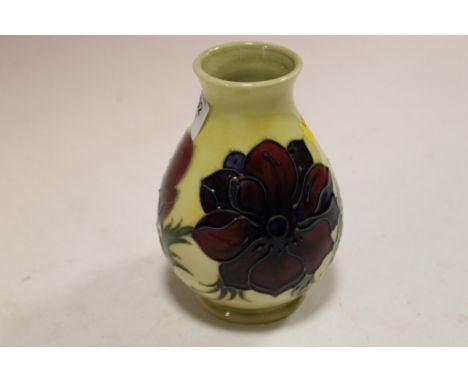 A VINTAGE MOORCROFT FLORAL YELLOW VASE
