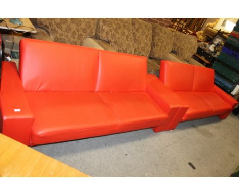 A PAIR OF MODERN RED ANGULAR SOFA BEDS