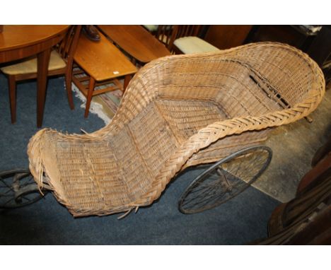 A VINTAGE WICKER INVALID/CONVALESCENCE CHAIR