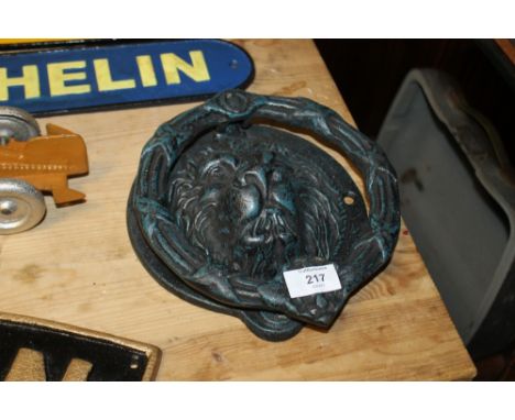 *A CAST LION HEAD DOOR KNOCKER**