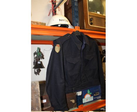 A COLD WAR NATIONAL HOSPITAL SERVICE RESERVE STEEL HELMET + WOMAN'S BATTLEDRESS BLOUSE WITH ORIGINAL BADGES