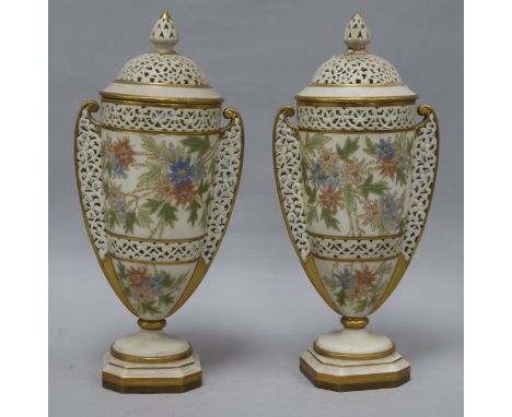 A pair of of Grainger Worcester lidded vases