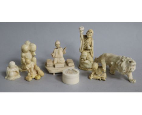 A group of Japanese ivory okimono and a jar, late 19th / early 20th century