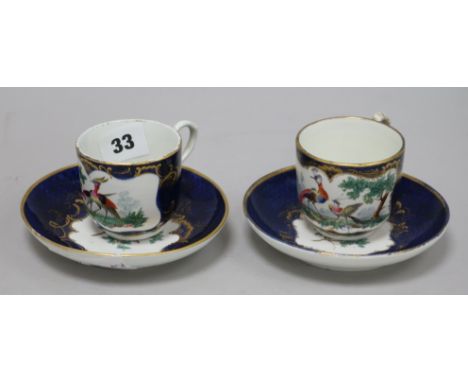 Two Worcester style scale blue cups and saucers