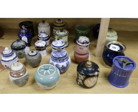 A collection of small ceramic tobacco and other jars and covers, including Carlton examples (23)