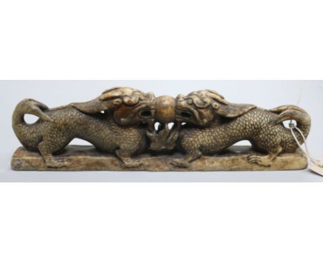 A Chinese stone confronting dragon scroll weight