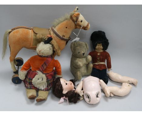 A Steiff felt horse on wheels, circa 1920 and a small quantity of other toys