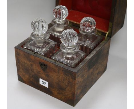 A burr walnut four bottled decanter box
