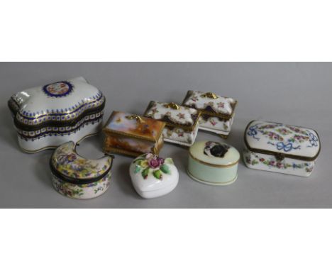 Eight ceramic boxes and covers