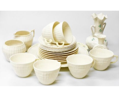 A group of Belleek porcelain, comprising a Shell pattern part tea service, brown mark, comprising, bread plate, cream jug and