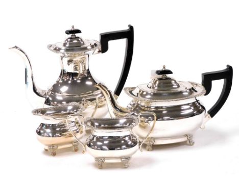 A Viners silver plated four piece tea and coffee set, with gadrooned rims, raised on four lion's paw feet, comprising teapot,