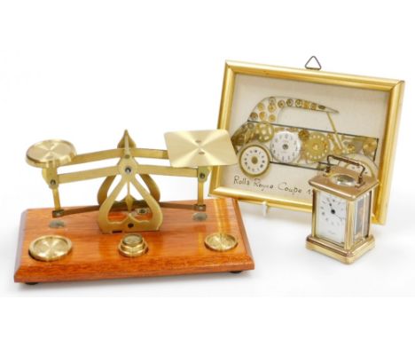 A set of brass and mahogany postal scales, with weights, a Rolls Royce picture made from clock parts, signed Kersh, and a min