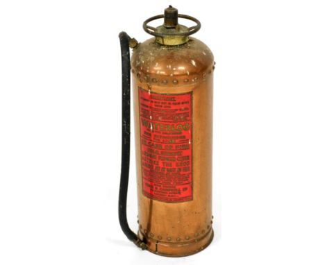 A vintage Waterloo copper fire extinguisher made by Reid and Campbell Limited, London, 56cm high.  