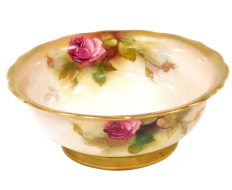 A Royal Worcester blush porcelain bowl, circa 1917, painted with roses, printed marks, 18cm wide.  
