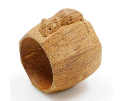 A Mouseman light oak napkin ring by Robert Thompson of Kilburn, 5cm high.   