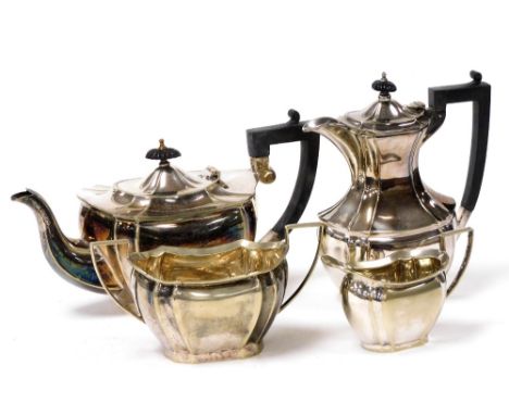 An early 20thC silver plated four piece tea and coffee set, of fluted form, comprising teapot, coffee pot, cream jug and suga