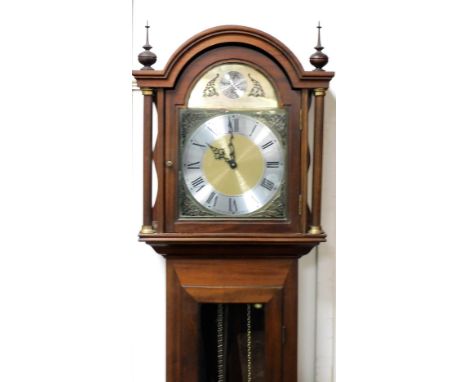 A longcase clock, the brass dial with silvered chapter ring bearing Roman numerals, stamped Tempus Fugit in a mahogany case, 