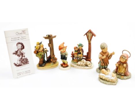 A group of Goebel Hummel figures, comprising Jesus, Mary (AF), Joseph, March Winds, Crossroads and Wayside Devotion. (6)  