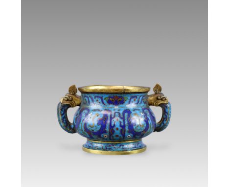 A cloisonne double handled censer, gui, the belly decorated with continuous archaistic dragon scroll motifs in blue against t