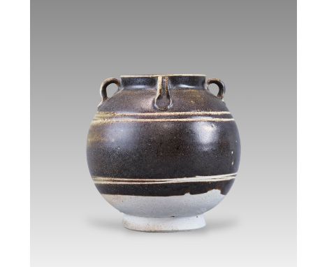 the globular body decorated with two horizontal pairs of narrow unglazed grooves at the shoulder and  lower belly, and with f