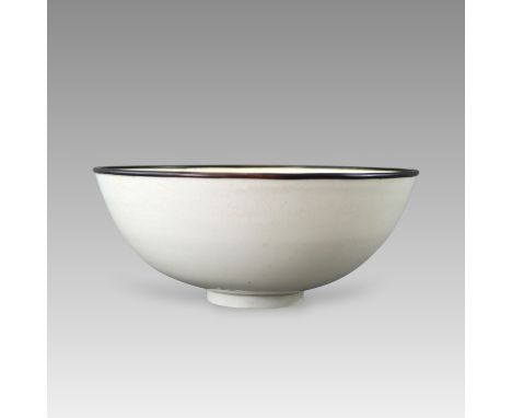 the rounded sides rising outwards from the short straight foot to the metal-mounted rim, and covered overall in a good ivory-