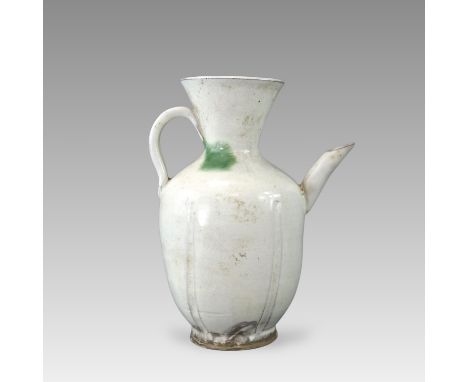 with a six-lobed body rising to a flaring neck, set on one side with a slightly curving neck opposite a strap handle, covered