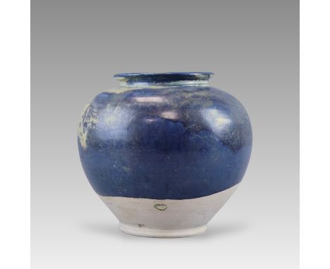 covered with a rich dark blue glaze that continues over the lipped rim and falls in an irregular line on the lower body, expo