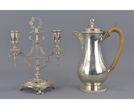 A Sheffiled Georgian coffee pot together with silver plated French candle stick. 13cm height and 22cm height