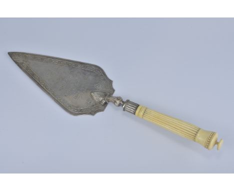 An English antique presentation trowel dated 26th May 1900. Length 30cm