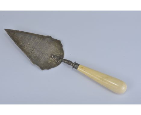 An English antique silver presentation trowel dated 19th May 1898. Length 31cm