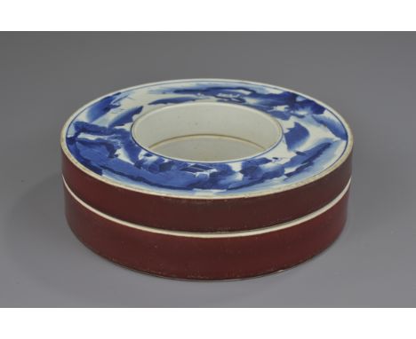 A Chinese 18/19th century blue and white porcelain court jewellery box, possibly Kangxi period. 21 cm diameter.