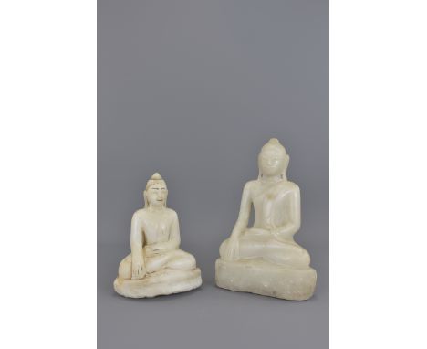 Two Cambodian 19th century marble seated buddhas. 20 cm and 25 cm tall. 