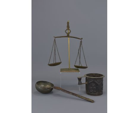 Set of Indonesian brass balance scales with tankard and ladle. 28cm height, 9.5cm tall, 30cm length,