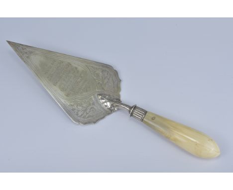 An English antique presentation trowel dated 13th August 1954. Length 35cm