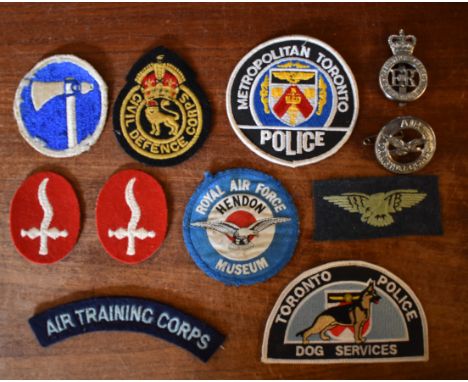 Military and Police Cloth patch collection (11) including Toronto Police Dog Service, Toronto Metropolitan Police, Civil Defe