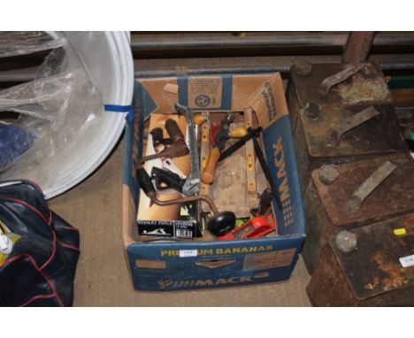 A box containing various hand tools